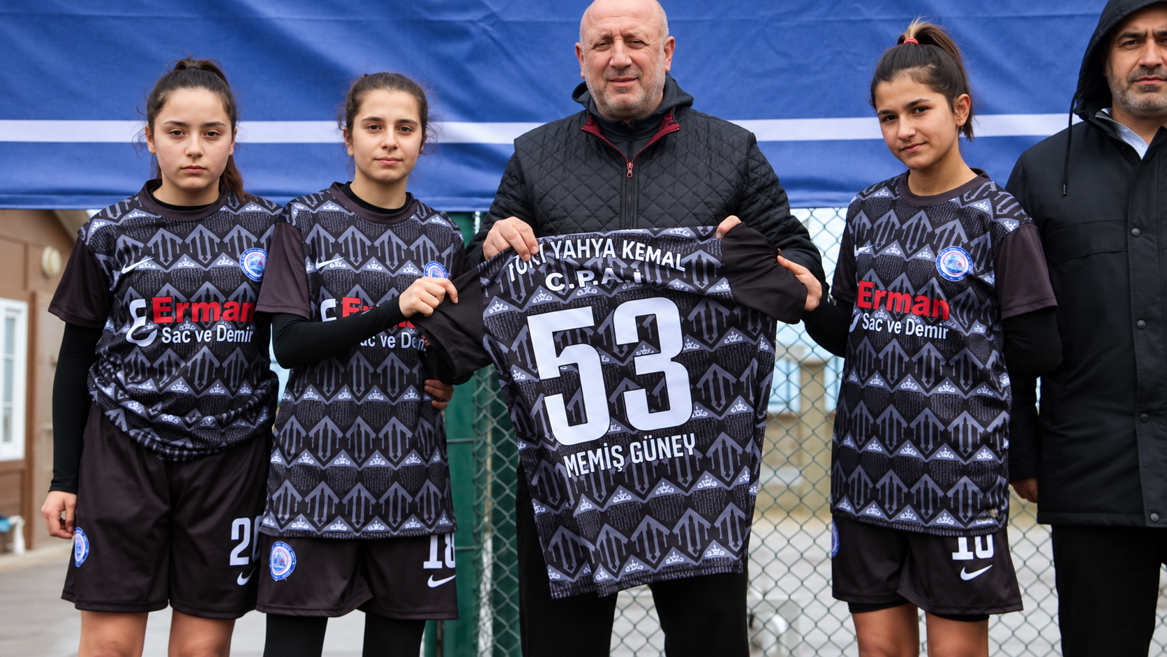 Girls' football team players in Erman Sac ve Demir kits in the kit sponsorship photo
